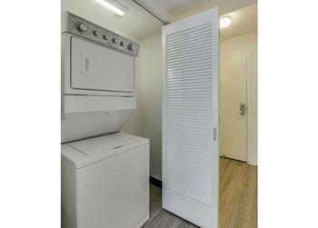 In-apartment, full-size stackable whirlpool washer and dryer